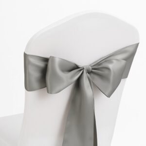 Light gray satin chair sash tied on event chair for elegant party event setup in Los Angeles