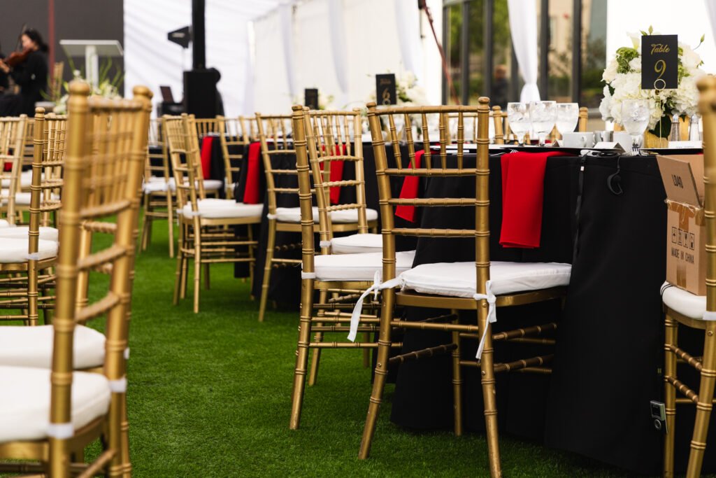 Healthcare Event Setup cross back natural chair round table black tablecloth